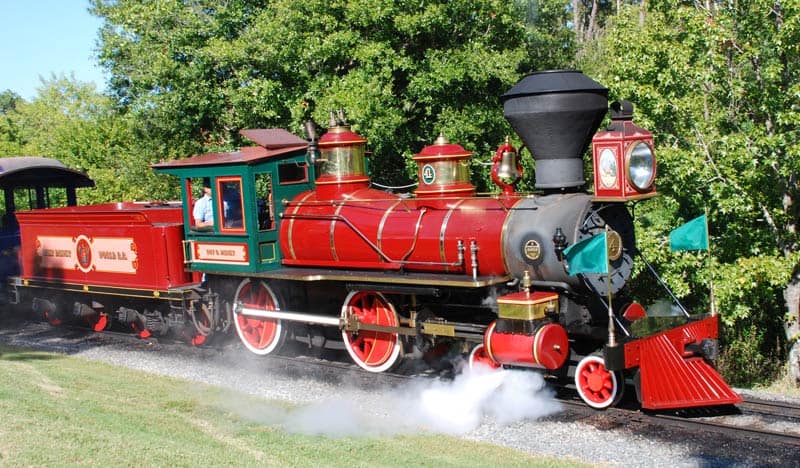 Locomotive No. 4 leading visitors around on the Walt Disney Railroad.