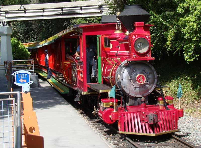 Ernest S. Marsh pulls into a station on the Disneyland Railroad.