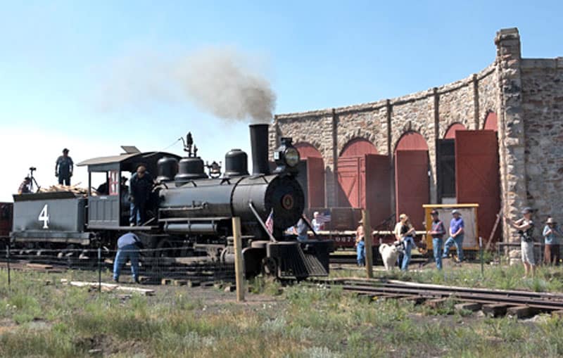 Klondike Mines #4 steaming outside of a roundhouse in Como, Co.