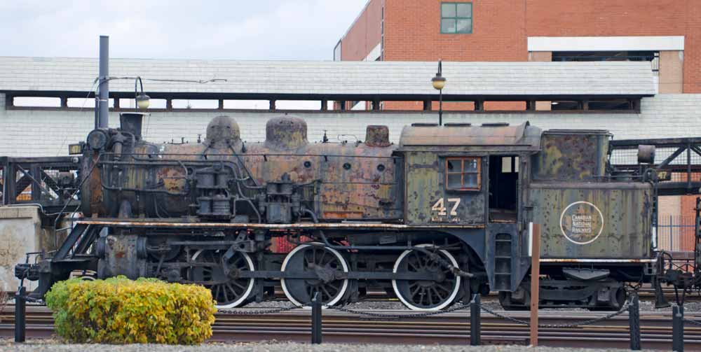 An unrestored Canadian National #47 sits on static display at the Steamtown National Historic Site.