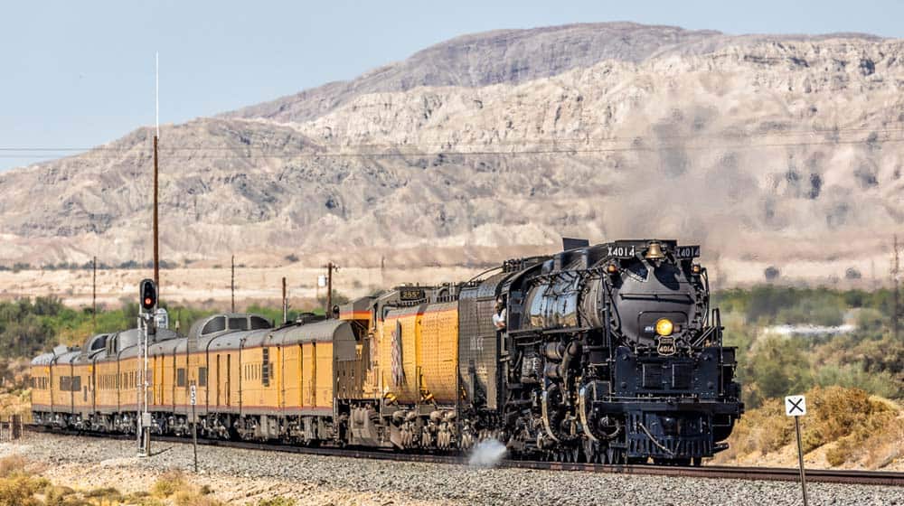 Union Pacific Big Boy 4014 leads a matched set of UP's Gray and Armour Yellow passenger cars.