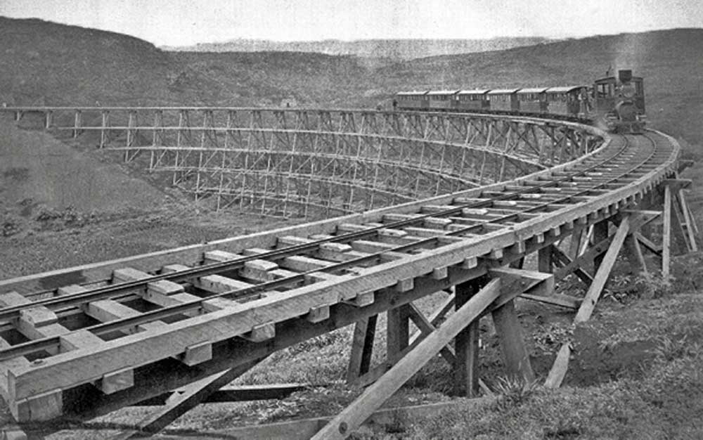 A large curved trestle on the way to Port Makukona. Built by the Hawaii Railroad, later the Hawaii Railway.