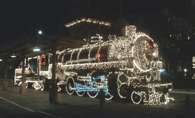 Many railroad museums and operators run Christmas trains, where locomotives and cars like Southern Pacific 794 are outfitted with lights and decorations.